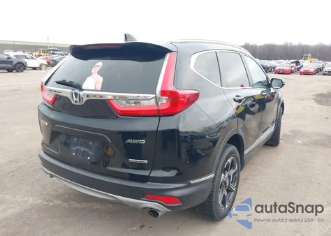 2018 Honda Cr-V Touring z USA, uszkodzony, nr VIN 7FARW2H9XJE067233